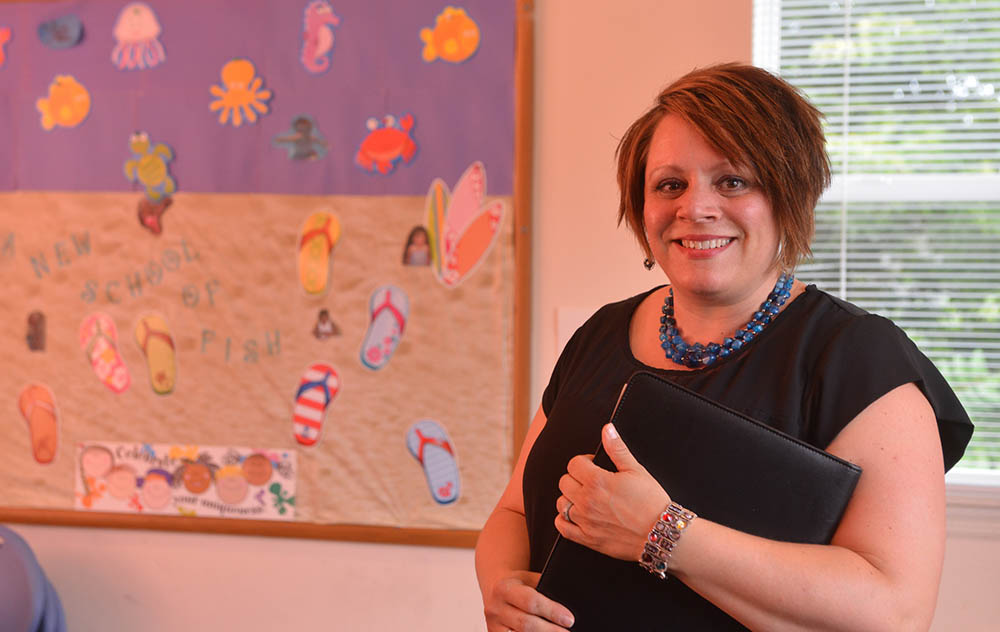 Pictured is B.A. behavioral sciences alumna Melissa Ferraro. | Photo by Jim Judkis